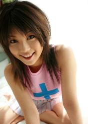 Adorable Japanese teen Azumi Harusaki bares her firm tits and hairy twat