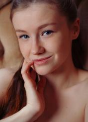 Beautiful teen Emily Bloom shows her irresistible shaved pussy up close