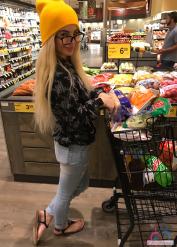 Blonde amateur Bella Rose exposes her tits and pussy in public places