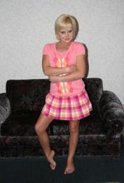 Blonde Kelly Surfer is not feeling shy to take her plaid skirt off for us
