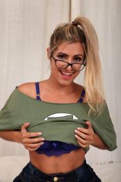 Brazilian amateur Mia Linz unveils her curvy figure while alone in a bedroom