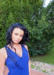 British solo girl Grace Joy hitches her dress up over her butt in a backyard