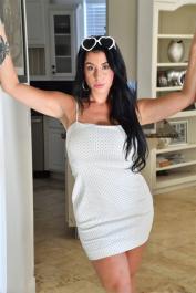 Brunette MILF Vickie parks her horny pussy upon a pink dildo