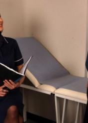 Brunette nurse Tindra Frost partially disrobes while watching a guy masturbate