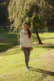 Brunette teen Alex Mae exposes her nice ass in the park on canvas sneakers