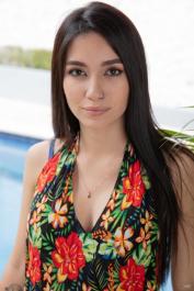 Brunette teen Kiki Cash doffs her dress and flaunts her incredible big boobs