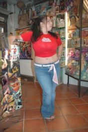 Chubby amateur MILF Devyn Devine plays with her monster tits at the toy shop
