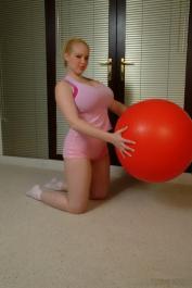 Chubby big tits Ashley Sage Ellison lets her melons hang on an exercise ball