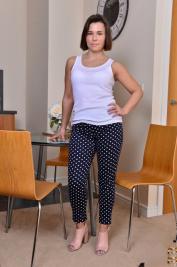 Curvy brunette MILF Jamie Ray shows her hot body and fondles her clam