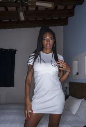 Ebony goddess Tina Fire teasing with her bountiful boobs & yummy bald pussy