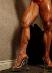Female bodybuilder Angela Salvagno parts her pussy lips after getting naked