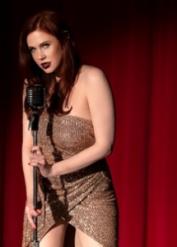 Gorgeous celebrity Maitland Ward does a sexy striptease on stage