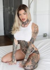 Heavily tattooed girl Chantal Danielle has sex with a couple of guys at once