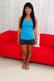 Latina hottie Kara Hartley uses her fingers to please herself on the sofa