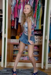 Petite amateur teen Alice toys her perfect pink hole in front of her closet