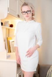 Petite blonde Hanna Rey wears glasses and OTK socks during hardcore sex