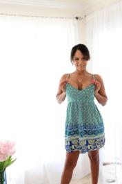 Phenomenal cougar Anjanette Astoria stripping and playing with her body
