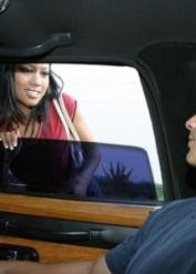 Seductive chick Lily Thai goes down on a big boner in the car