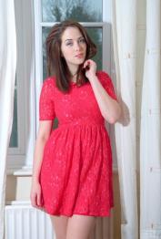 Seductive model Elizabeth James sheds her red dress to reveal nice big tits