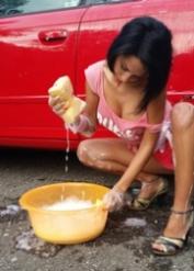 Skinny amateur MILF Anisyia XXX flaunts her big ass while washing her car