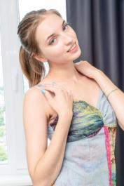 Sweet Ukrainian teen Vika Lita uses a vibrator to please herself in the chair