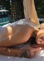 Tattooed blonde Dylan Moore has POV sex in a backyard environment