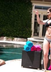 Tattooed Latina Jean Michaels taking cum on big tits outdoors by pool